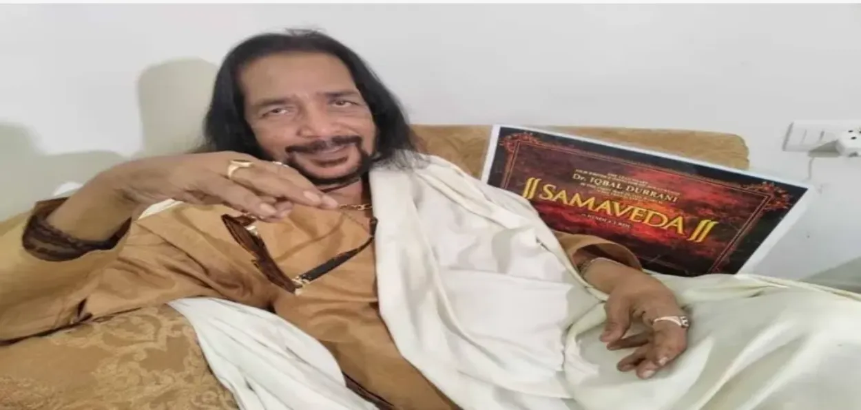 Iqbal Durrani with his Book on Samaveda