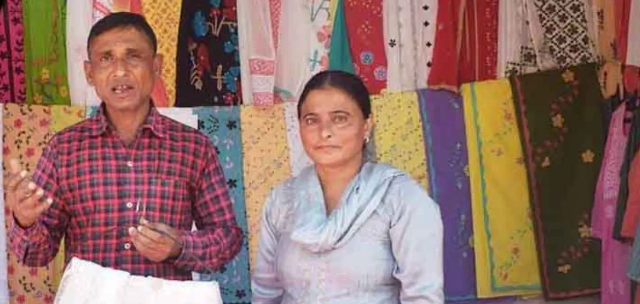 Afsana with her Husband Ayub at the stall 