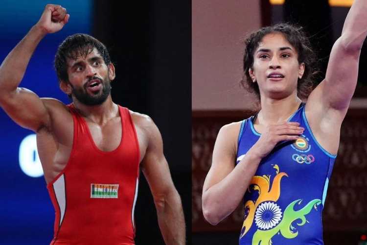 Wrestlers Bajrang Punia, Vinesh Phogat to train abroad