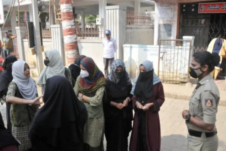 A police officer engaging with Muslim women in Tamil Nadu