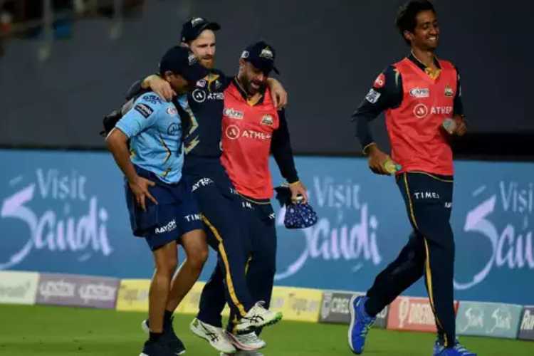 Kane Williamson being helped off the field after his injury in GT's opener in the current IPL