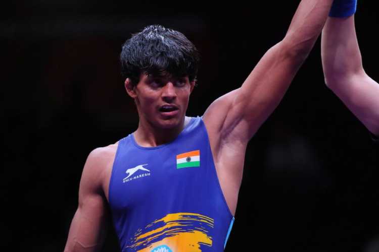 Vikas added another medal on day three to India's tally in the Asian Wrestling C'ships