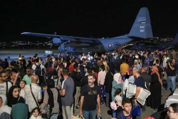 Foreign nationals waiting to be evacuated from Sudan