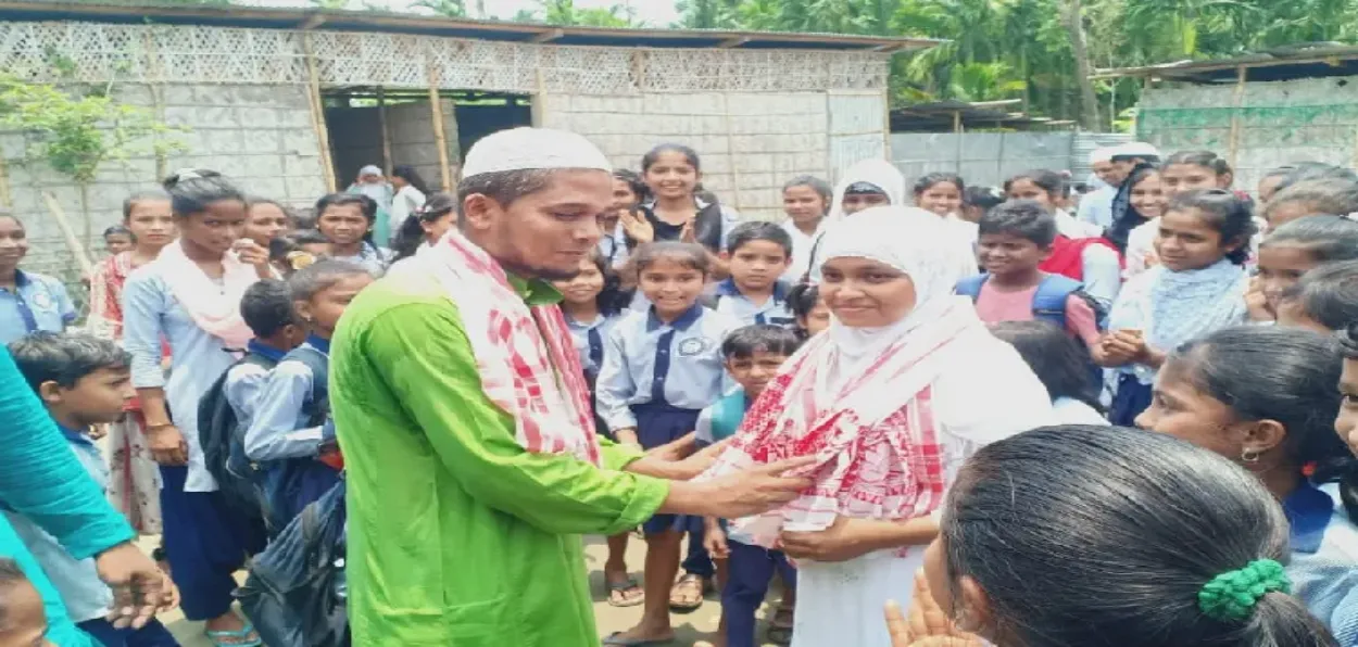 Nargis Sultana being felicitated by her neighbours after her she scored a distinction in her matriculation examinations