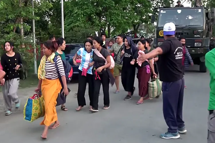 Stranded people in Manipur who were rescued by Assam Rifles