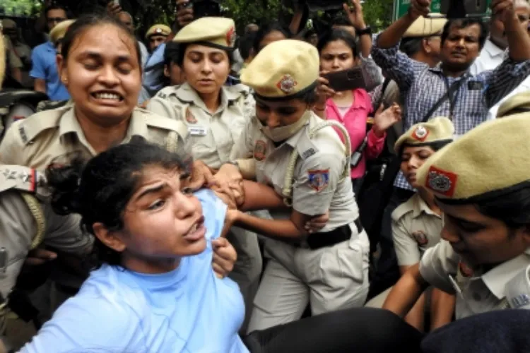 Wrestler Sakshi Malik resisting use of force by police