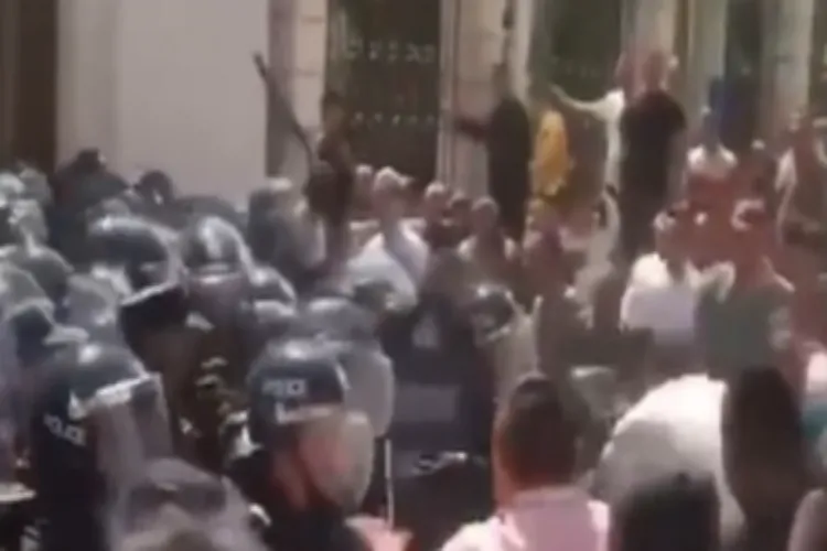 Protesters clash with police over the planned demolition of a mosque's dome in Yunnan, China