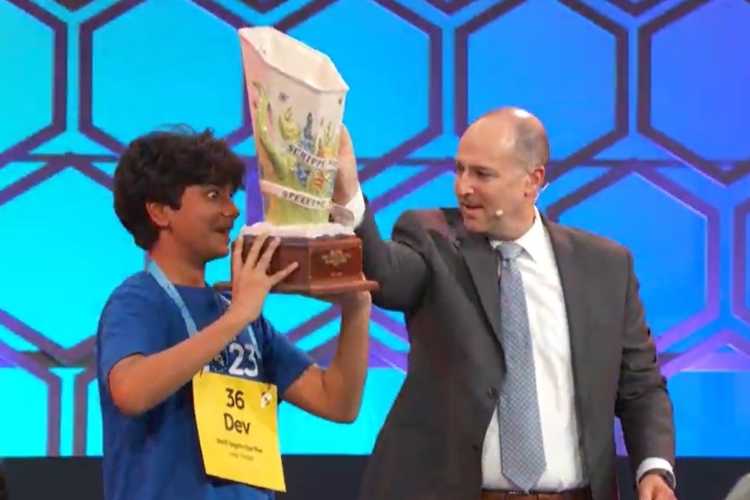 Dev Shah with the winner's trophy