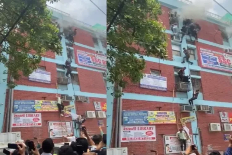 Students in a coaching academy in north Delhi trying to escape from fire in the building