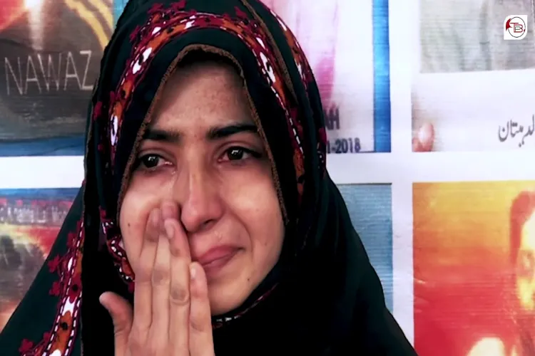 A woman grieving for her missing family  member