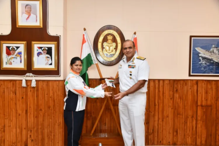 Indian Navy Vice-Admiral Sanjay Bhalla with the woman Navy officer
