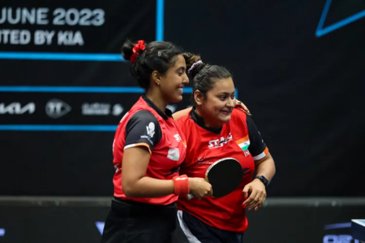 Table tennis players Ayhika Mukherjee and Sutirtha Mukherjee celebrating their victory in the Asian Games in China 
