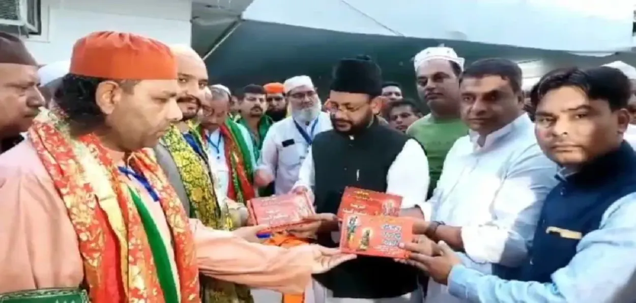 Shadab Shamas handing over the gifts for Pakistani Hindus to visiting Pakistanis at the shrine of  Sabir Makhdoom Shah