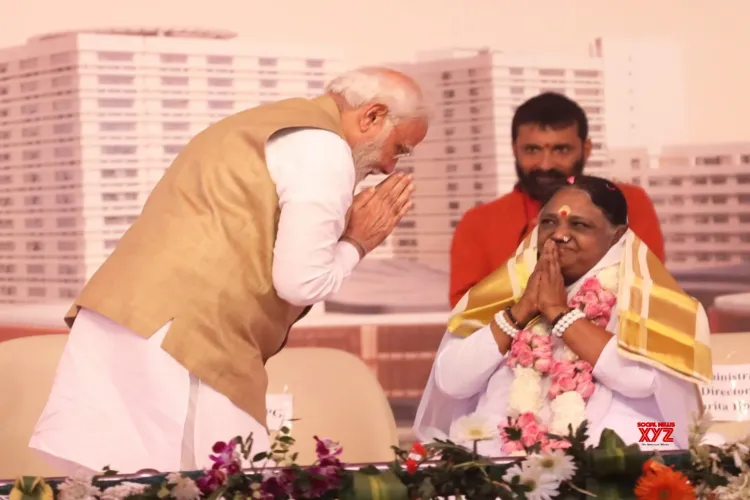Prime Minister Narendra Modi with spiritual leader Mata Amritanandamayi