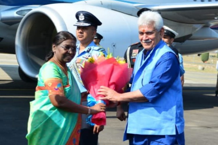 President Droupadi being received by Lt Governor Manoj Sinha