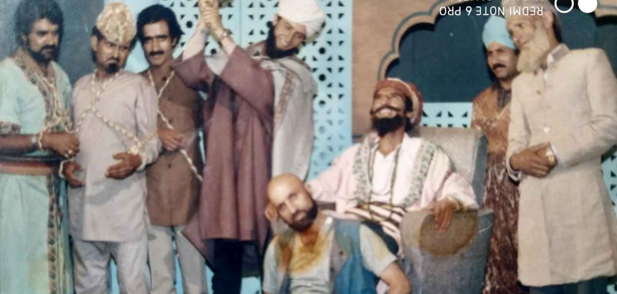Nazir Josh (seated) as Ahad Raza - scene from the serial Hazaar Daastaan