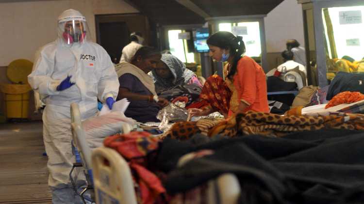 Doctor attending to Covid patient in a Delhi hospital (Pic Ravi Batra)