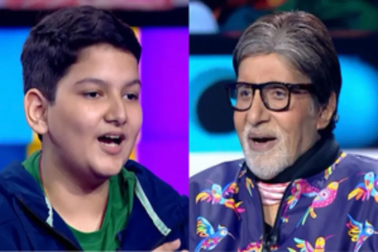 Actor Amitabh Bachchan with a contestant on 'Kaun Banega Crorepati15'