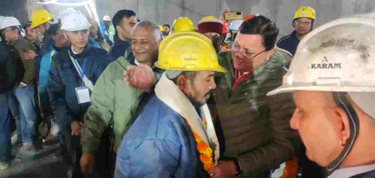 One of the rescued workers with CM Pushkar Singh Dhami