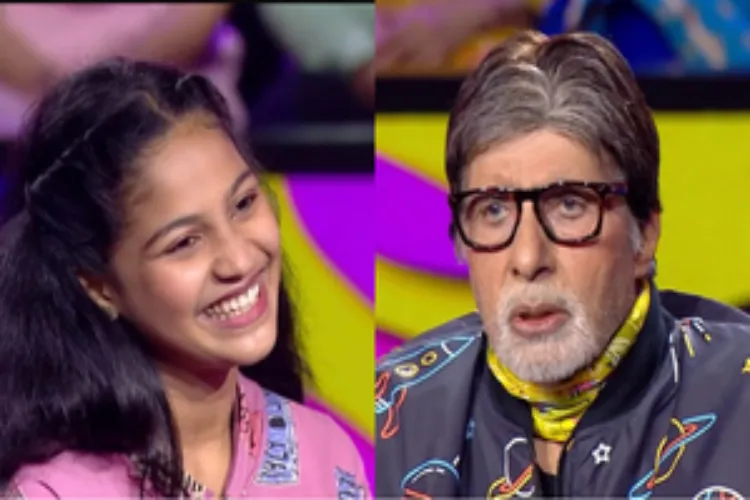 Actor Amitabh Bachchan with a contestant on 'Kaun Banega Crorepati15'