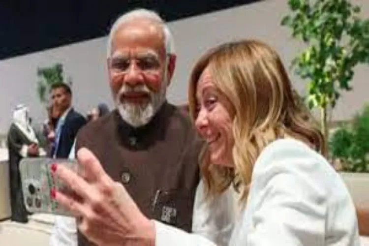Italian Prime Minister Georgia Meloni taking a selfie with Prime Minister Narendra Modi