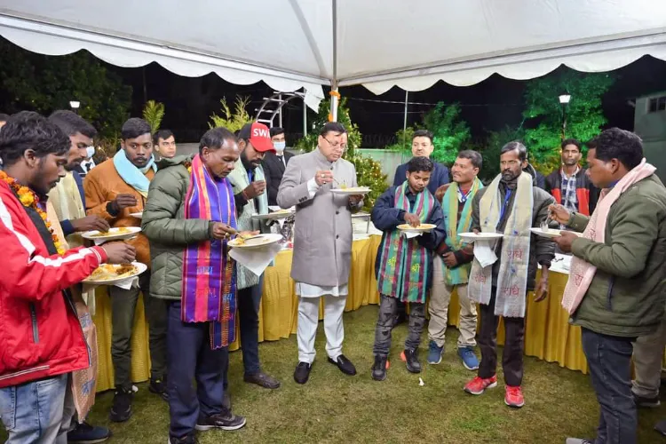 Uttarakhand Chief Minister Pushkar Singh Dhami with rescued workers from the Silkyara tunnelngh Airi at Tanakpur in Champawat district. Airi is one of the 41 workers trapped in the Silkyara Tunnel.