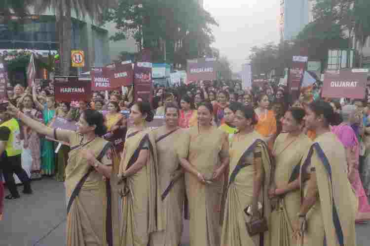 Police woman in sari during the Sari Walkathon in Mumbai