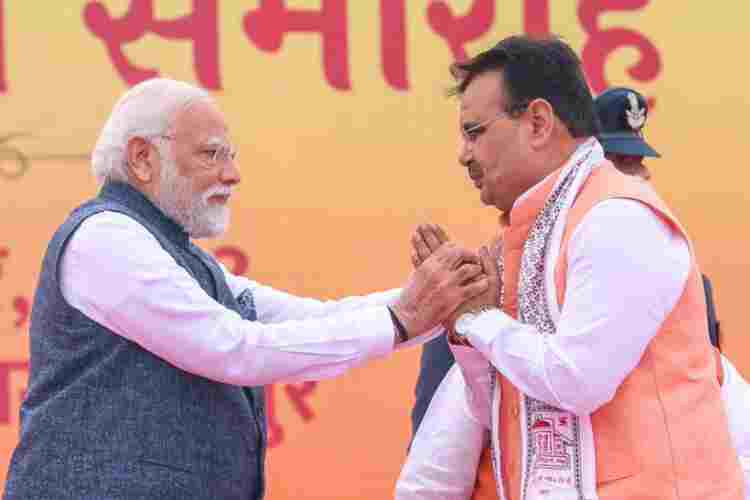 Prime Minister Narendra Modi congratulating Bhajanlal Sharma after he took oath of office as Chief Minister of Rajasthan

