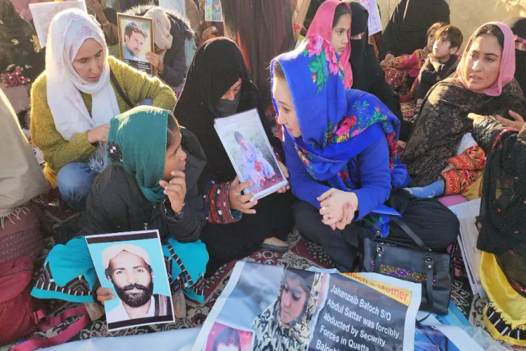 bALOCH WOMEN HOL;DING PROTESTS AGAINST FORCED DISAPPEARANCES IN ISLAMABAD