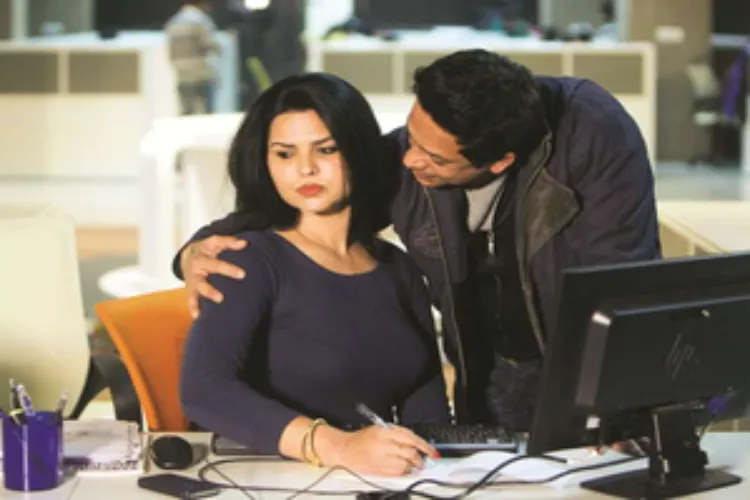  A representational image of a man and woman in workplace