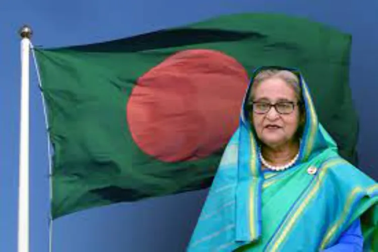Bangladesh Prime Minister Sheikh Hasina with the flag of Bangladesh