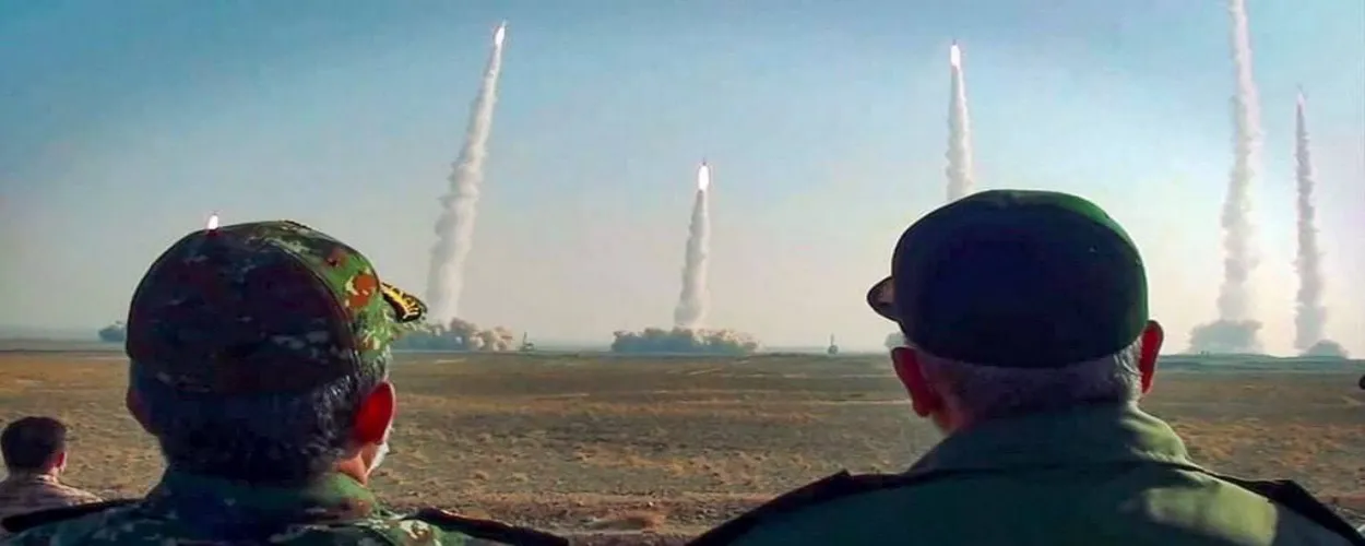 Islamic Revolutionary Guard Corps (IRGC)  men watch missiles fly into Balochistan, Pakistan (X)