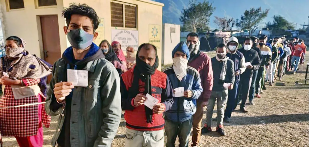 People waiting in queues to cast their votes aty a booth in reasi (File)
