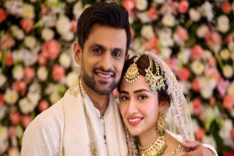 Former Pakistan cricketer Shoaib Malik with his new wife and Pakistani actress Sana Javed