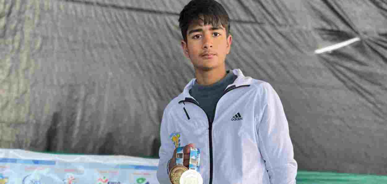 Zerhan Ashaiq with his medals