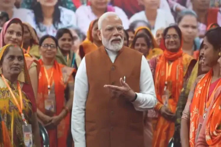 Prime Minister Narendra Modi with women dairy entrepreneurs in his constituency 
