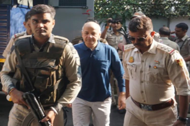 Manish Sisodia, former Deputy Chief Minister of Delhi with policemen near a Delhi court