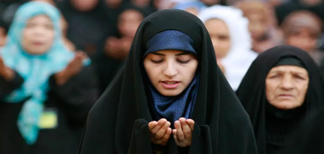 A Muslim woman in prayers