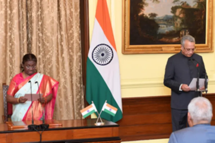 President Droupadi Murmu administering the oath of office of Chairperson, Lokpal to former apex court judge, Justice Ajay Manikrao Khanwilkar,