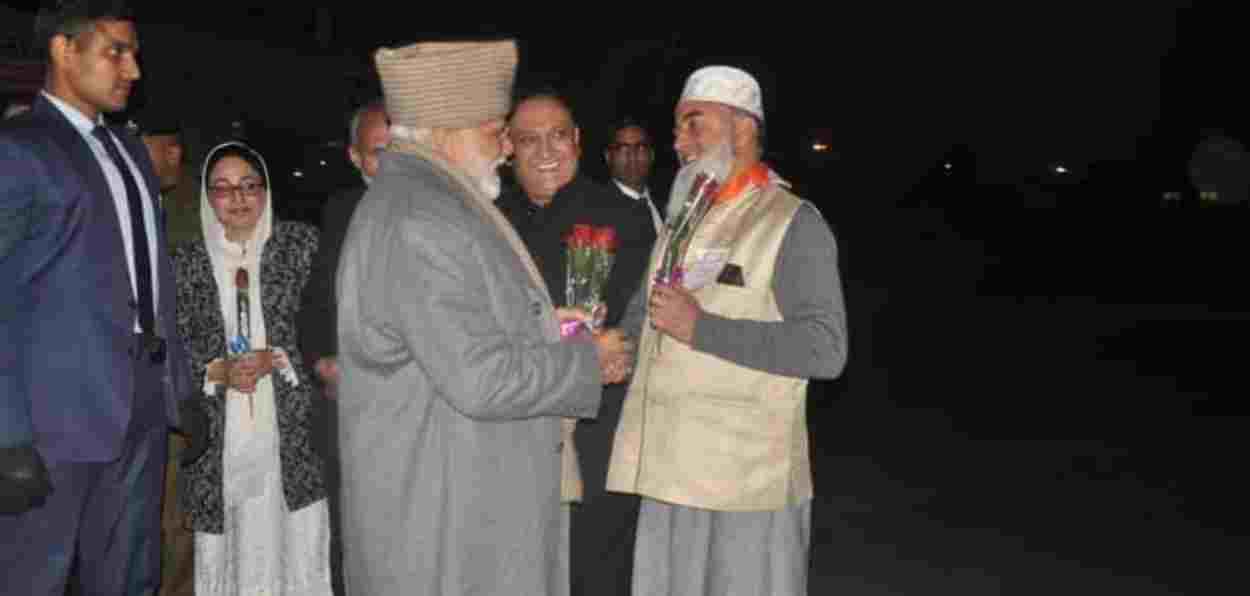 Mohammad Ashraf Hajam receiving Prime Minister Modi at Srinagar airport in 2019