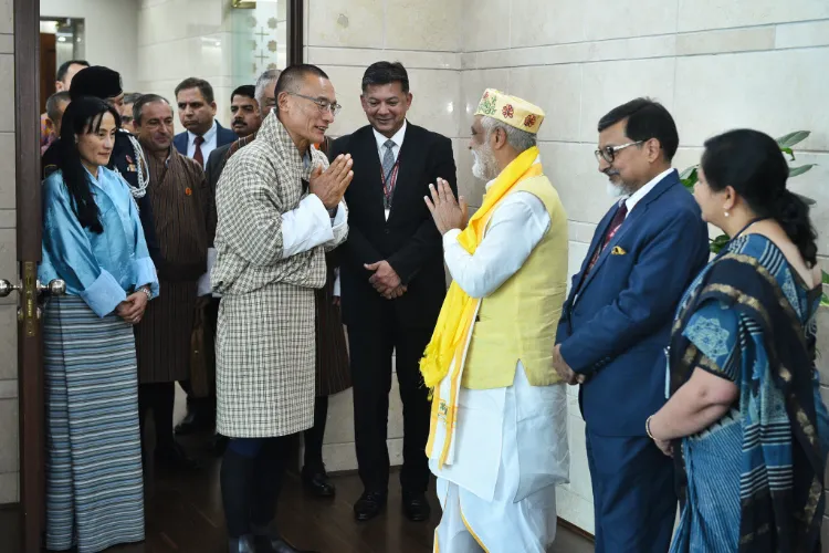 Bhutan PM Tshering Tobgay and his wife being received by Minister of State, Ashwini Kumar Choubey