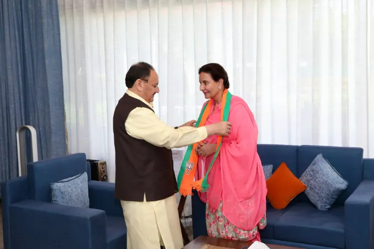 Former Congress MP, Preneet Kaur being greeted by BJP National President, J.P. Nadda