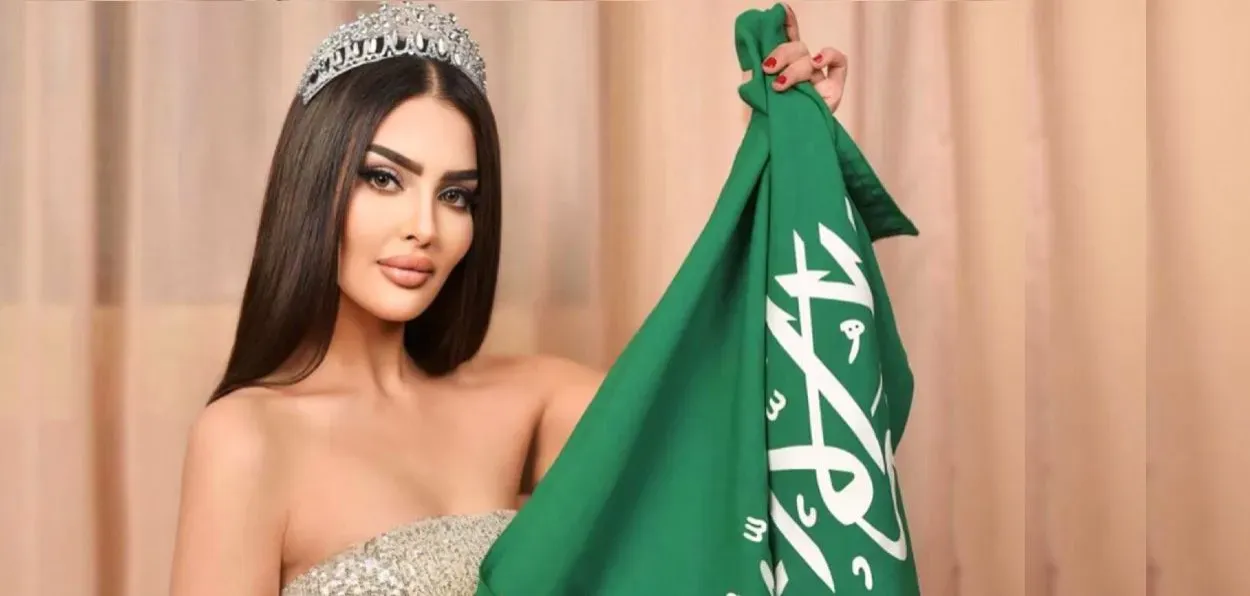 Miss Saudi Arab Rumy Alqahtani holding her national flag (Instagram)