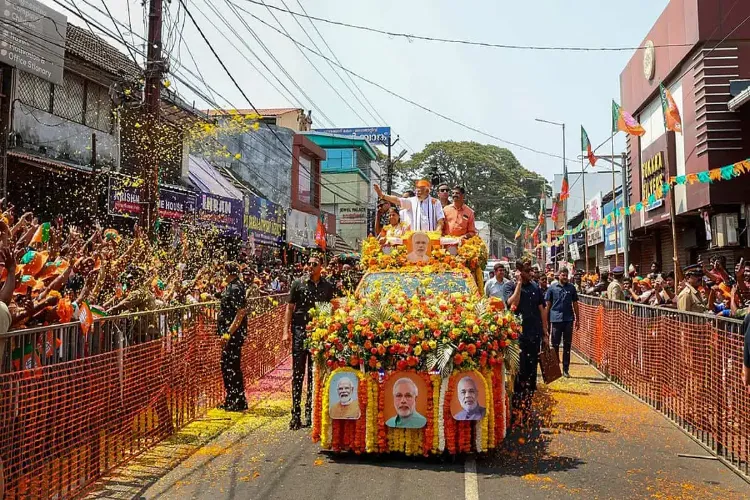 Prime Minister Narendra Modi holding a roadshow in Ghaziabad