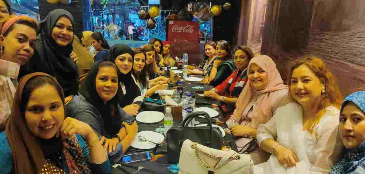 Rukhshi Kadiri Elias with members of Tajira celebrating Eid