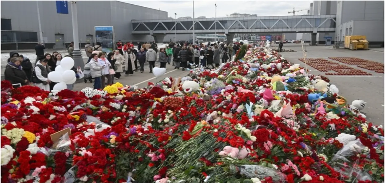 Bouquets placed outside the crocus city hall, Moscow,  in memory of the massacred people (X)