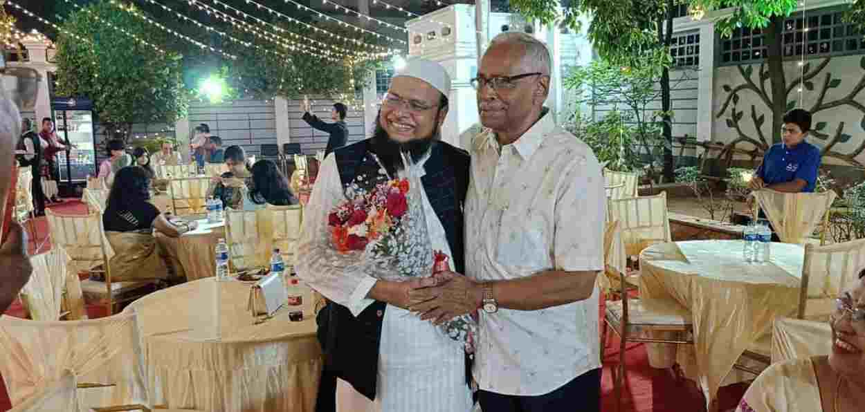 Dr Mahbubul Hoque greeting Padma Shri Dr Sarveshwar Saharia, globally-known urologist, at Eid-Bihu celebration