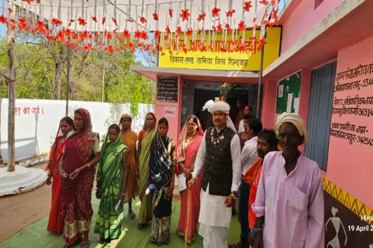 Voters outside a booth in Chhindwara which recorded a voter turnout of 82.39 per cent