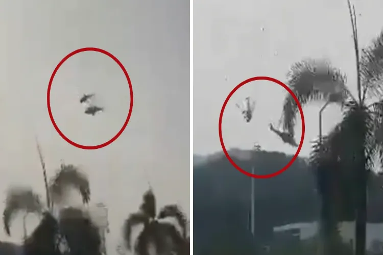 Screen grab from a video showing collision and collapse of two Malaysian helicopters