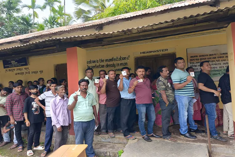 Voters in Tripura waiting in a queue for their turn